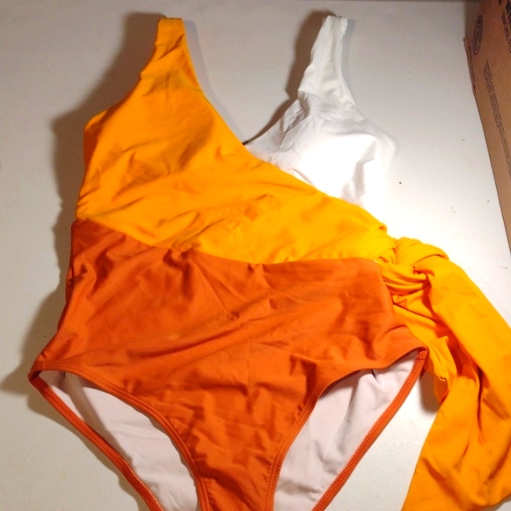 Smismivo women's one piece bathing suit size LG, Tie up side
